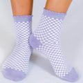 Lavender and white checker print sock with scallop ruffle edge.