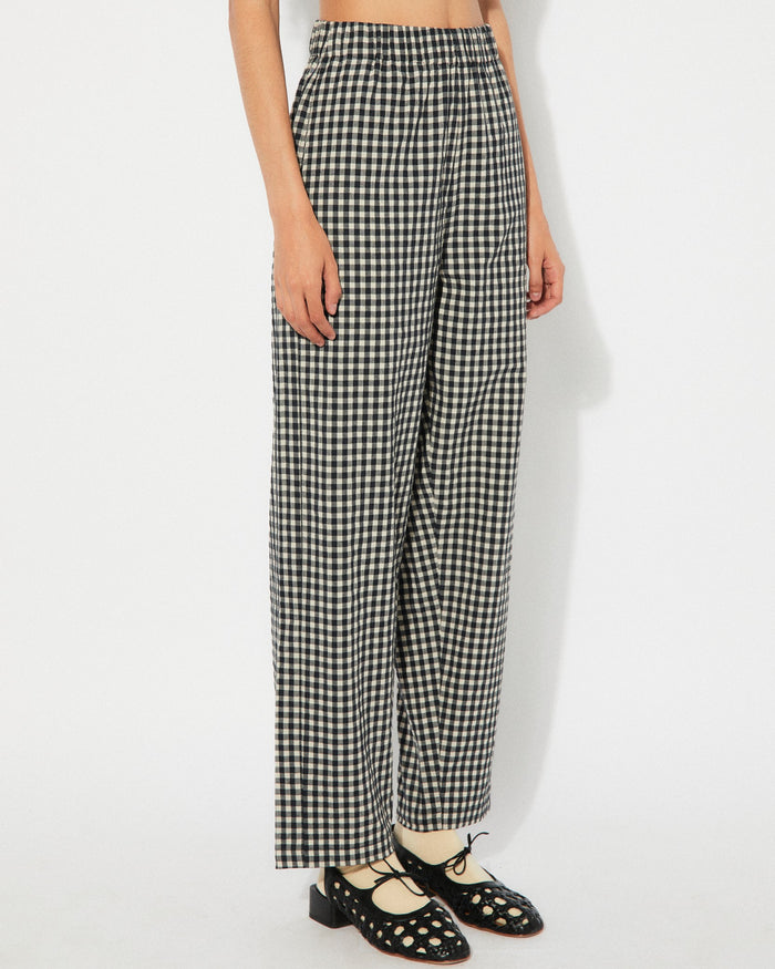 Black gingham checkered cep pants by Rita Row with an elastic high waist at Clad, a sustainable clothing boutique in Asheville, NC