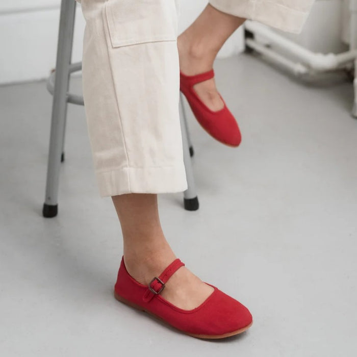 Classic red mary janes with natural rubber soles made by Small Lot Co at Clad, a sustainable clothing boutique in Asheville, NC