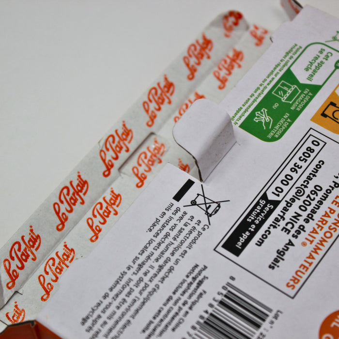 Le Parfait kitchen scale retail box interior with Le Parfait branded tissue paper.