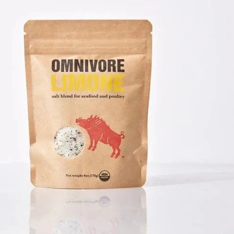 Omnivore Limone salt blend for seafood and poultry, 6oz kraft pouch with red wild-boar illustration.