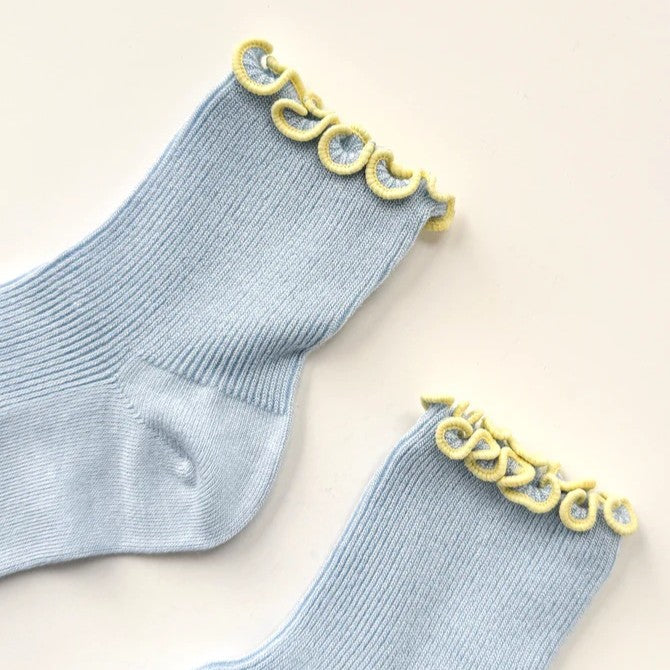 Le Bon Shoppe and Noble baby blue and butter yellow ruffle petite socks