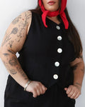 Noble shell utility vest in ash, paired with a red cashmere bandana