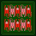 Silk and cotton cheetah print bandana with green background and pink and poppy orange red cheetahs at Clad, a sustainable clothing shop in Asheville, NC.